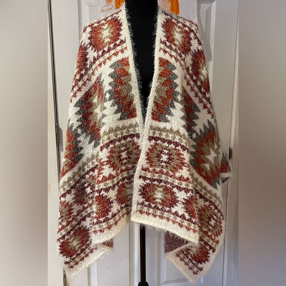 Shyanne Multicolored/tribal pattern poncho. Warm, soft and unique. One Size